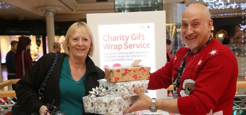 Darren Frost-Younger, technical services manager at intu Metrocentre, lending a hand at the gift wra