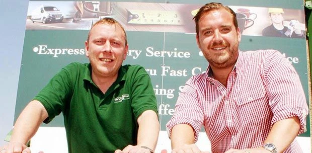 aylor’s Timber Centre managing director Charles Taylor, right, with depot manager Asa Dixon.