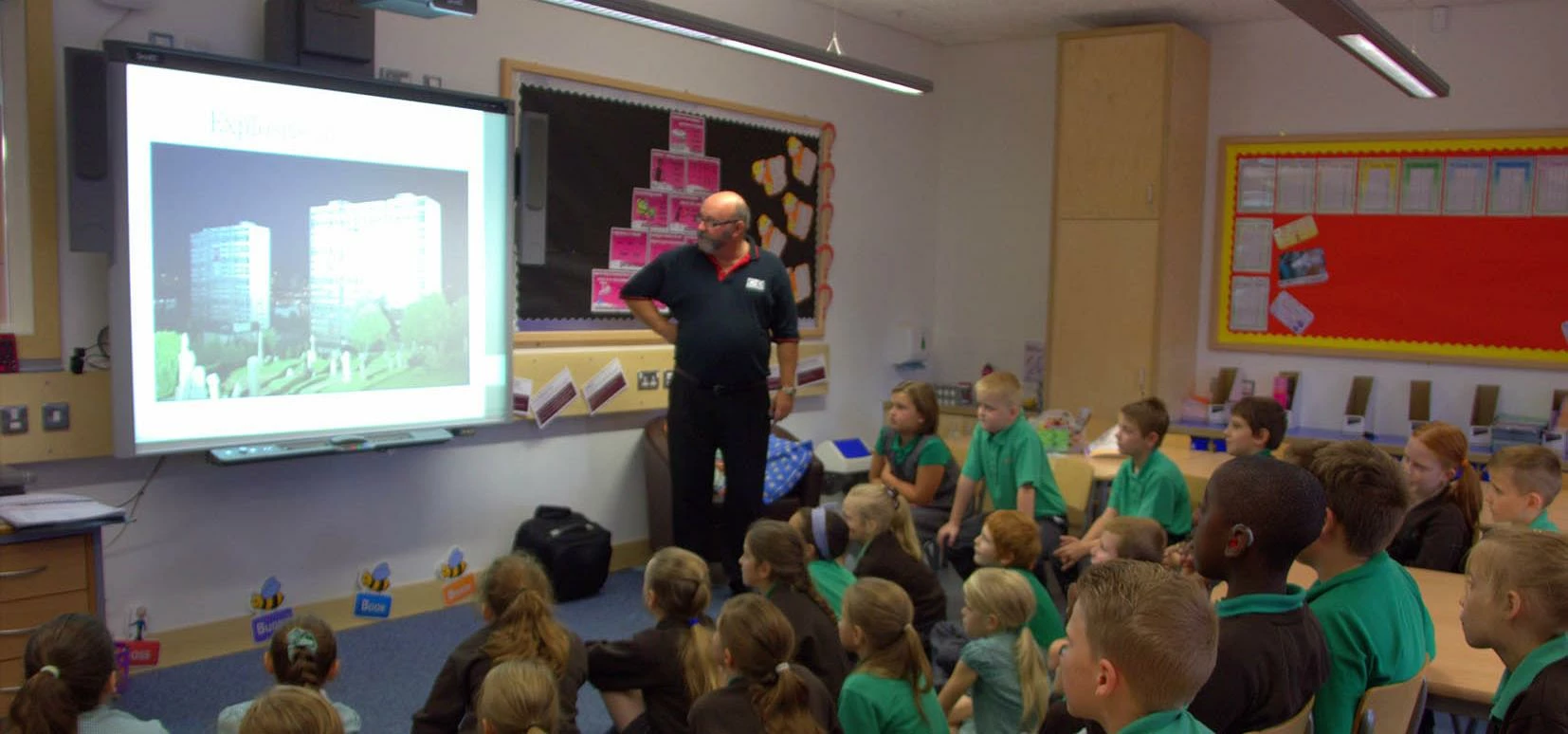 John Woodward talking to children about a career in demolition 