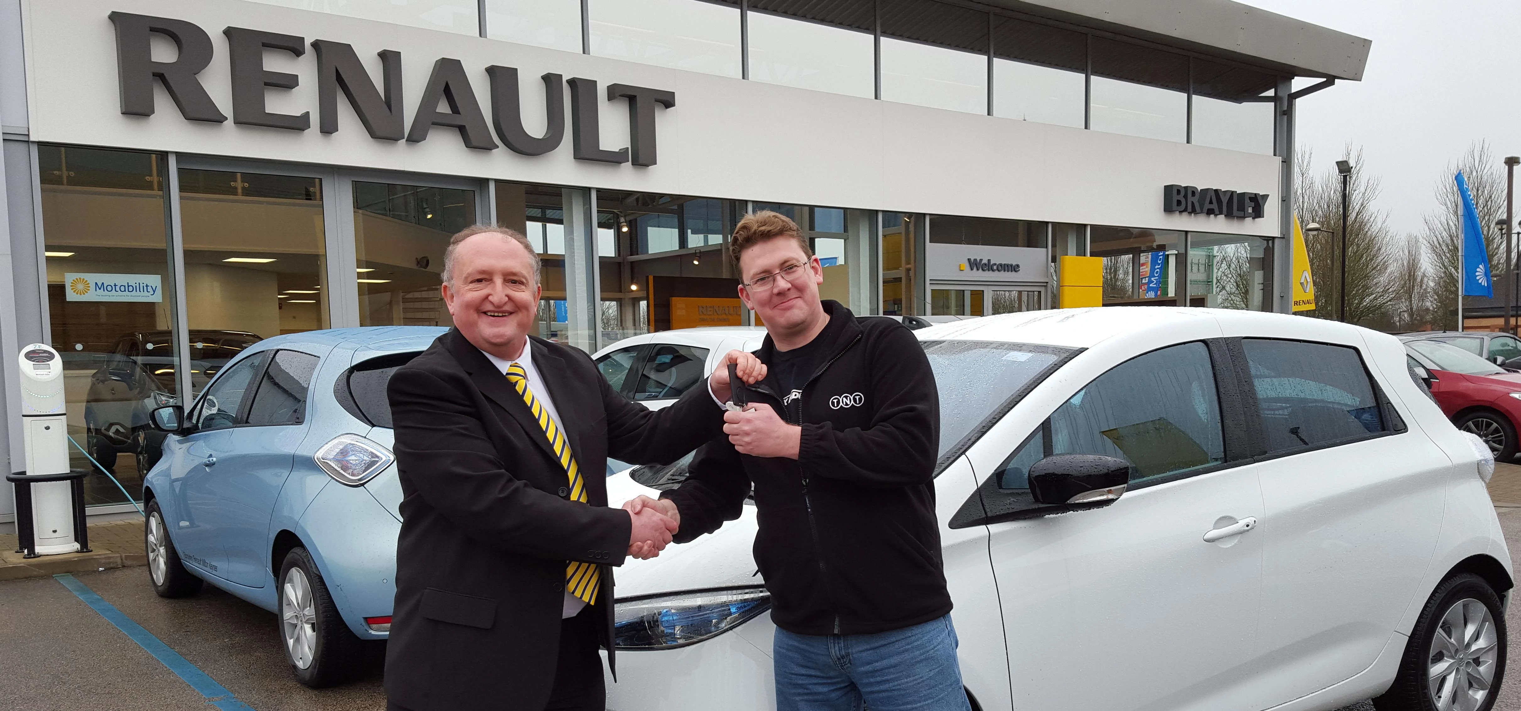 David Wallace from Milton Keynes, receives the keys to his new Renault ZOE from Brayleys’ sales exec