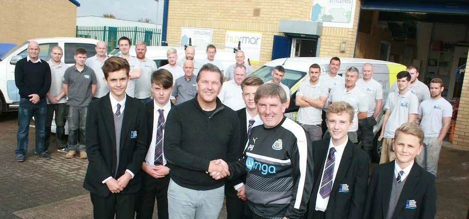 David Smailes with Peter Beardsley and students from James Calvert Spence School, as well as Smailes