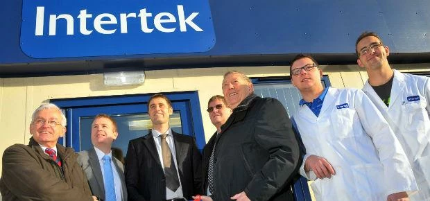 Intertek chief executive UK & Eire Robert Van Dorp looks on as Grimsby MP Austin Mitchell and Cleeth