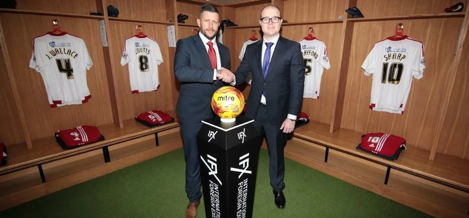 IFX Associate Dealing Director, Simon Hughes (right), with Sheffield United Head of Commercial, Paul