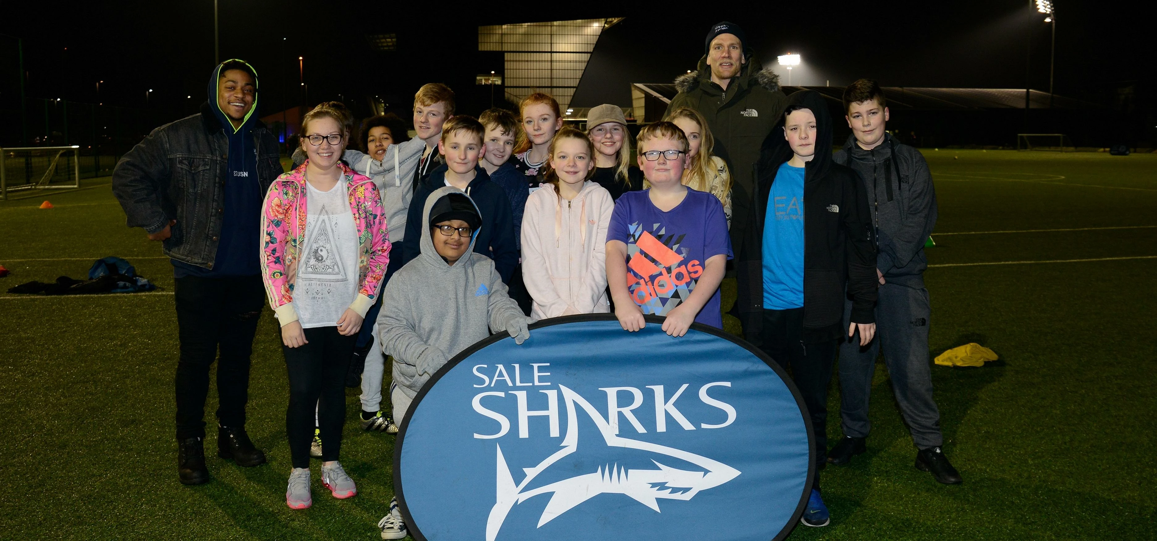 Sale Sharks players Magnus Lund and Paulo Odogwu with youngsters from RECLAIM
