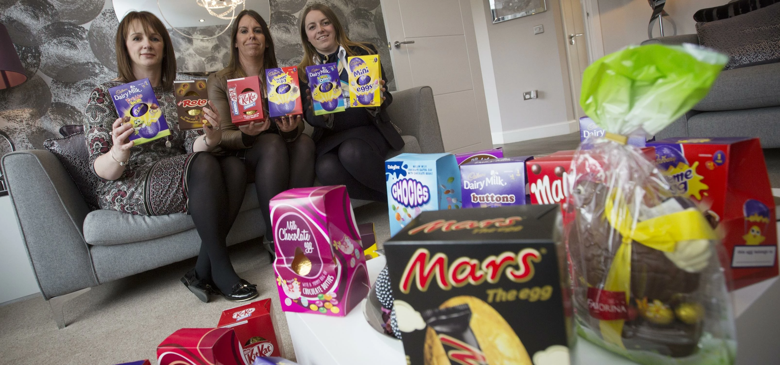 Action for Children Bedlington’s Sharron Johnson and Emily Hale and Miller Homes’ sales adviser at T