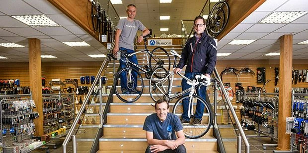  Tony Booth (front), managing director of All Terrain Cycles, with two of the team, Steve Howes (lef