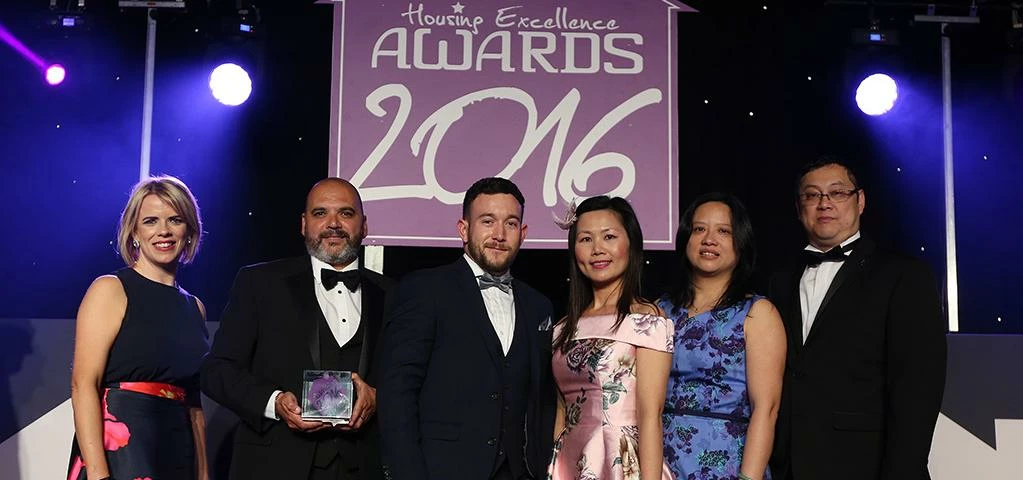 Pine Court staff are presented with the award for Small Social Landlord of the Year