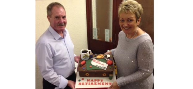 John and Maureen Hall with their retirement cake from Bizspace.