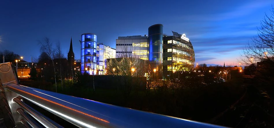 Newcastle Business School at night 