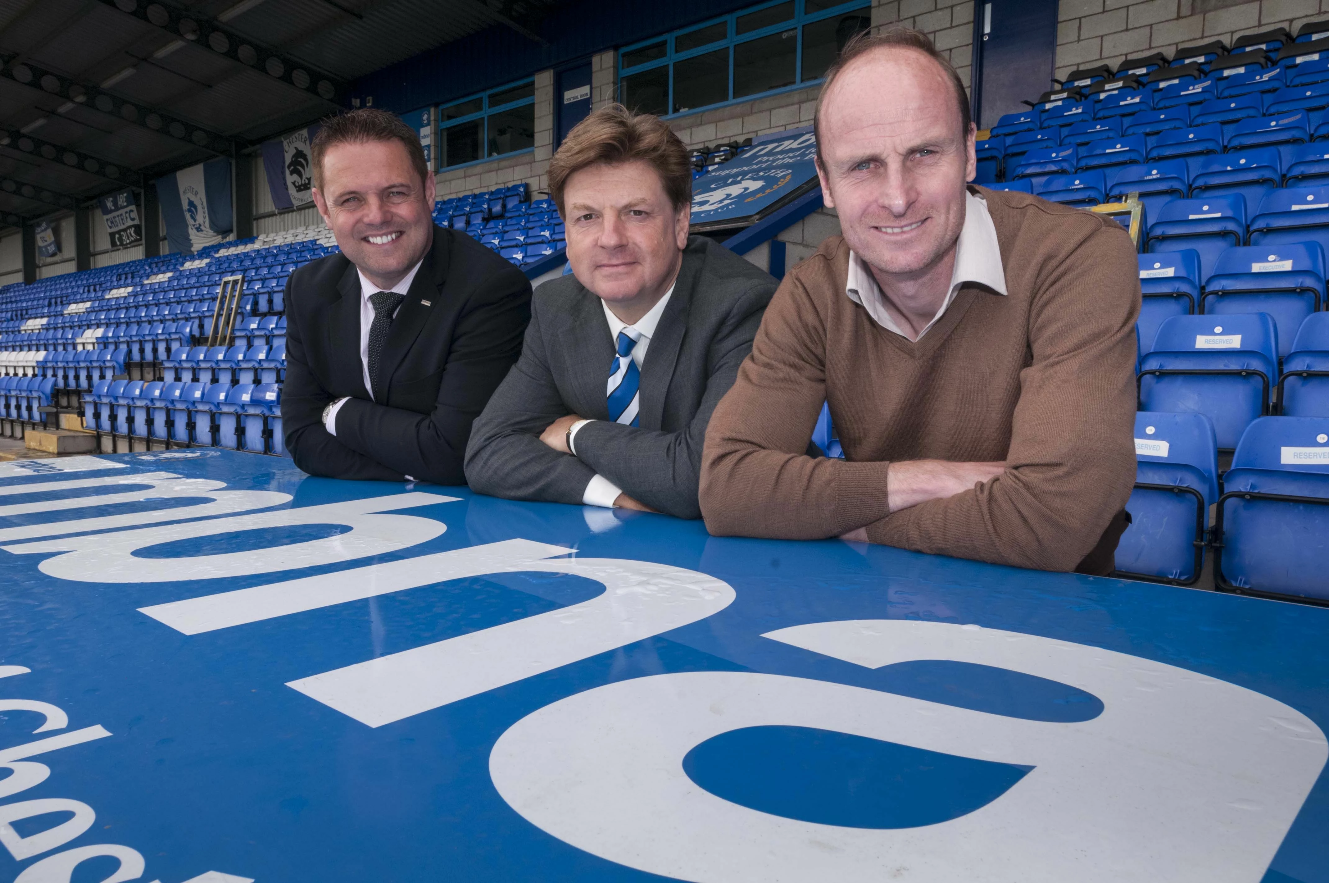 Sean Humphreys, a Trustee of the MBNA Foundation, Chester FC Director David Evans and Assistant Mana