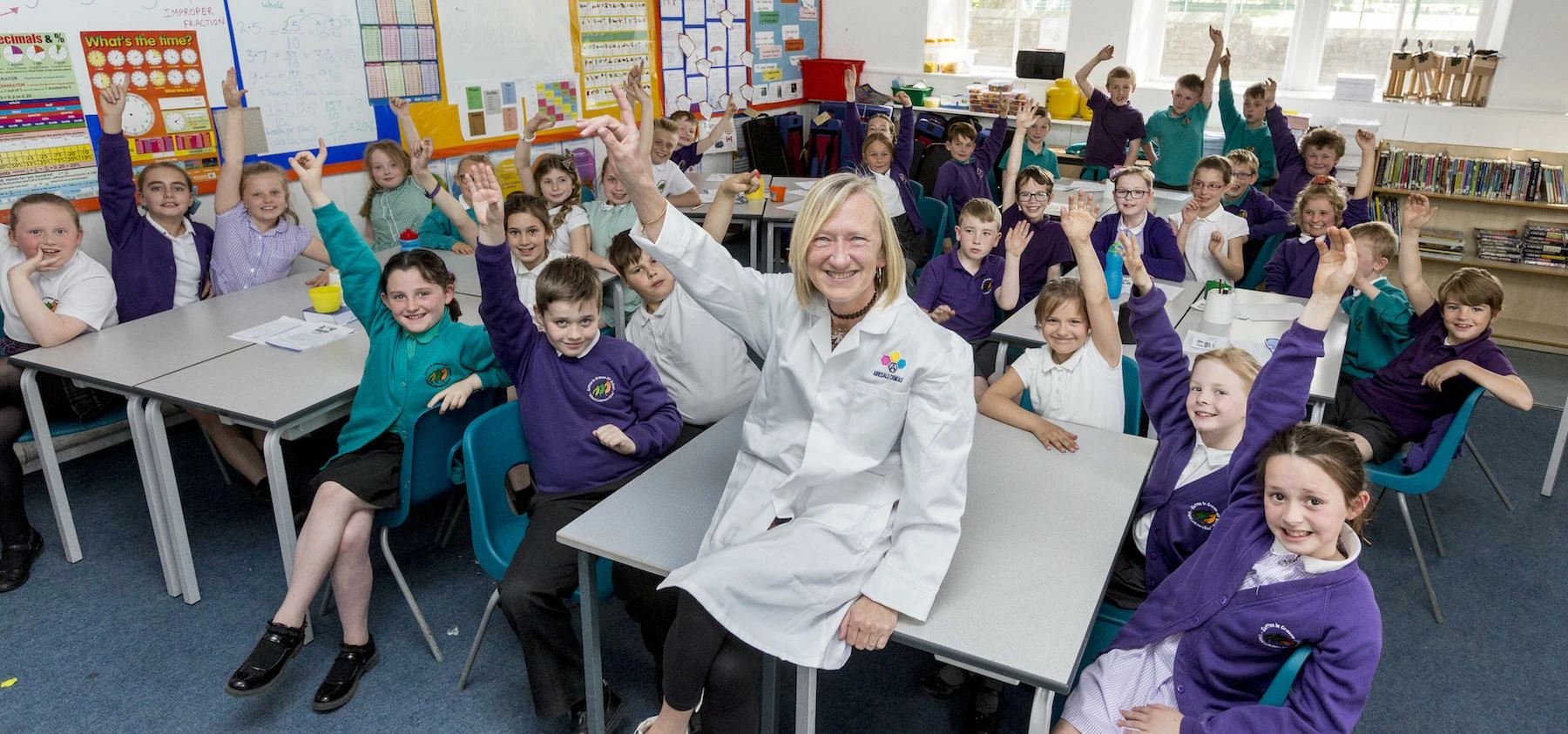 Laboratory technician, Madeleine Lofthouse with year 4 pupils at Sutton-in-Craven Community Primary