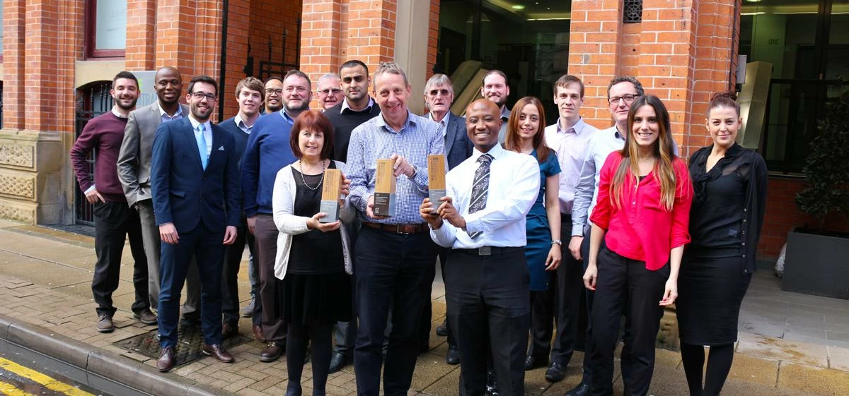 The BCM team outside their Manchester Offices