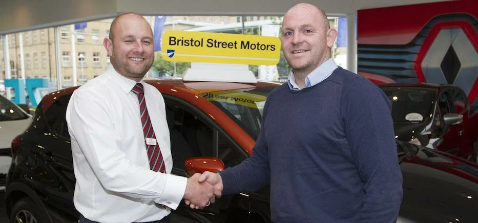 Bulls commercial manager Rob Parker with Graeme Dickens, general manager of Bristol Street Motors Br