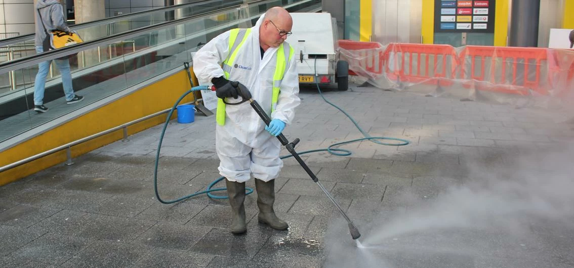 CleanSafe operative David Avers uses 'melt and blast' gum removal technique at Gatwick Airport's Nor