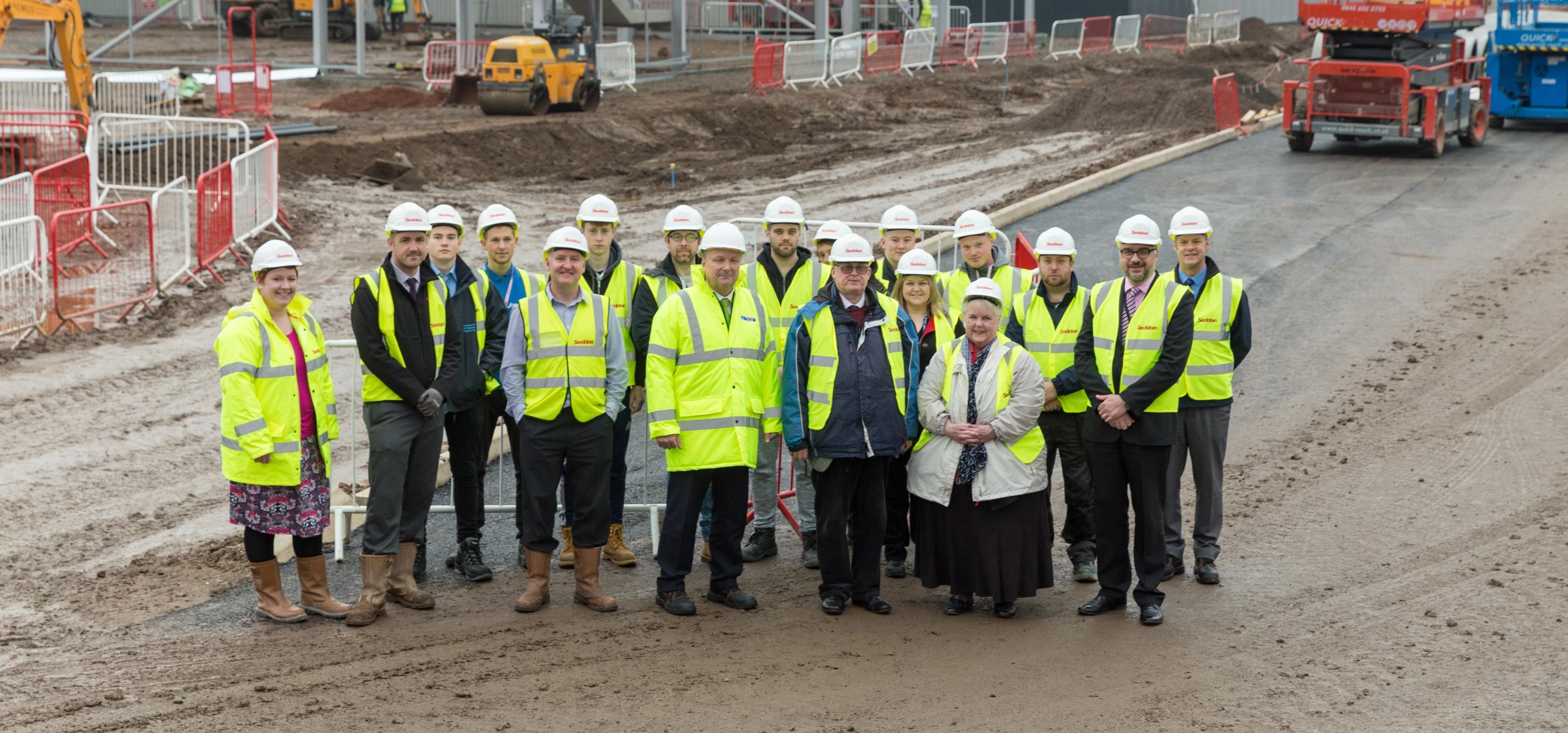 Stockport College students with representatives from Seddon and Stockport Council at Aurora Stockpor