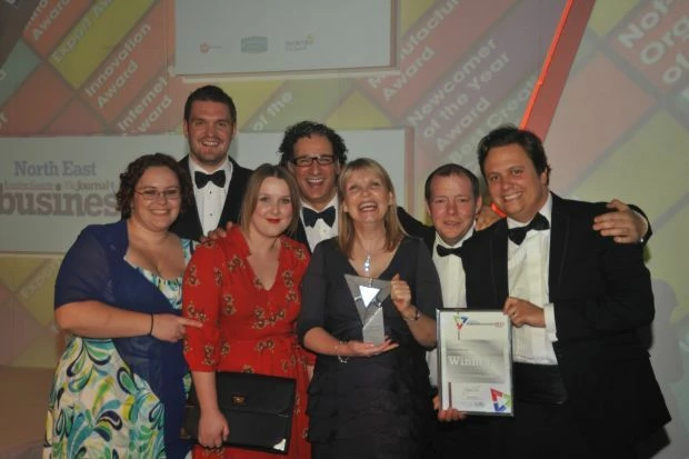 The Odyssey team celebrate winning the service Award in the North East Business Awards.