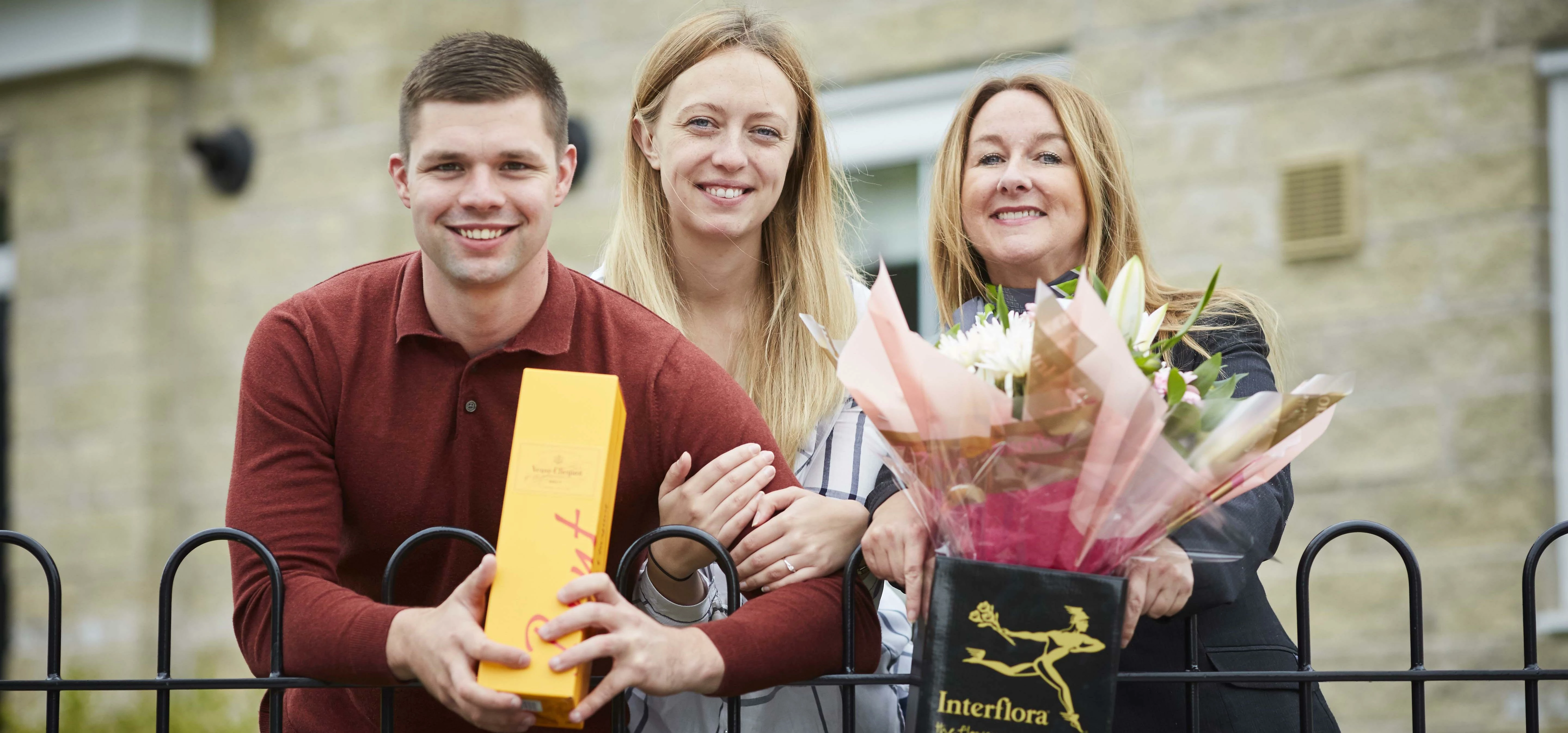 The happy couple - pictured with Sales Advisor Janet