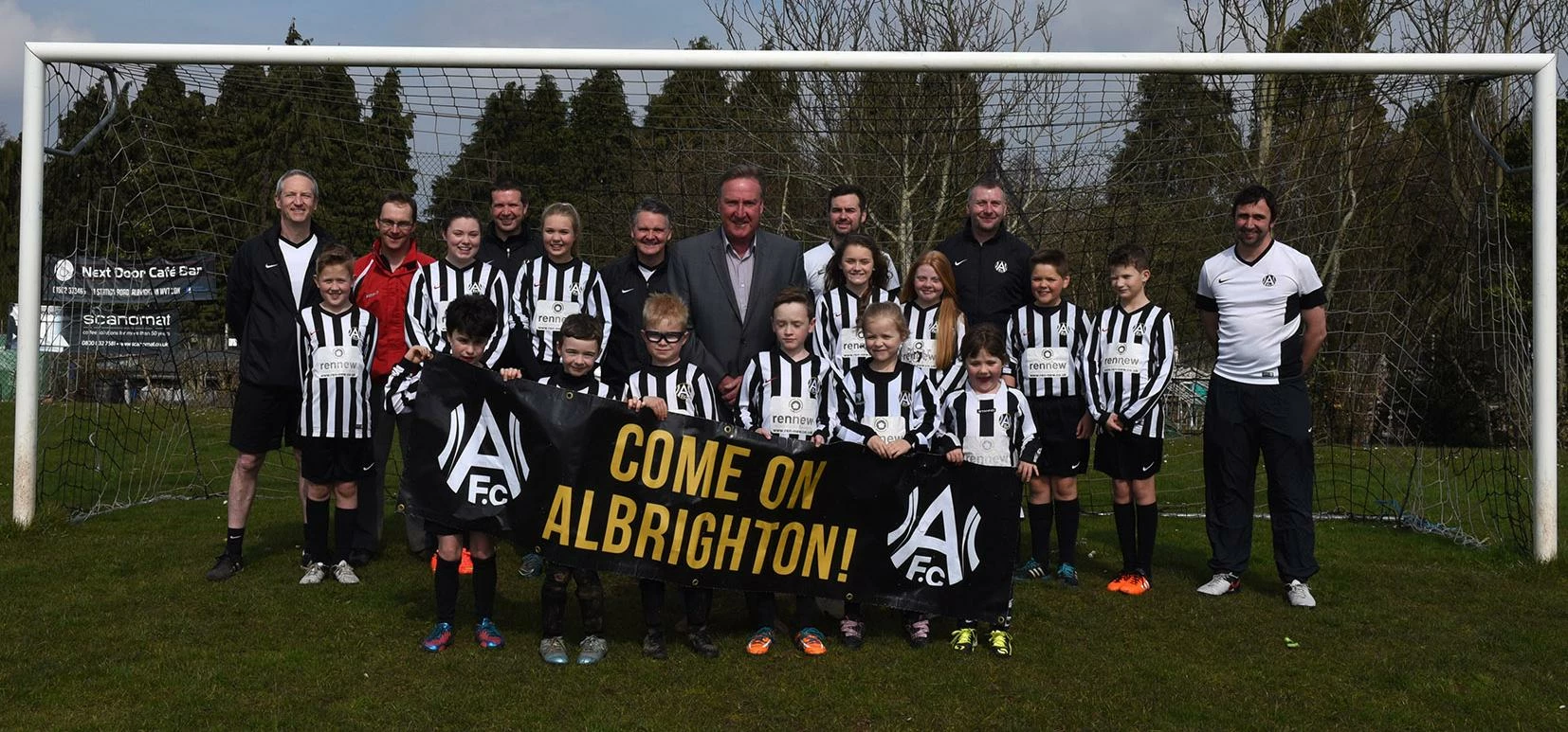 Steve Daley (middle) with coaches and players from Albrighton FC