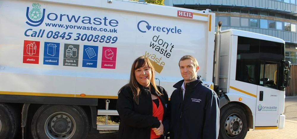 Mark Clough and Gill Mulroe with a waste collection vehicle at the University of York
