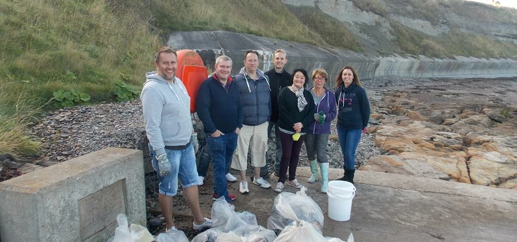 Staff from Virgin Money with a small selection of the rubbish collected, photo Steve Lowe