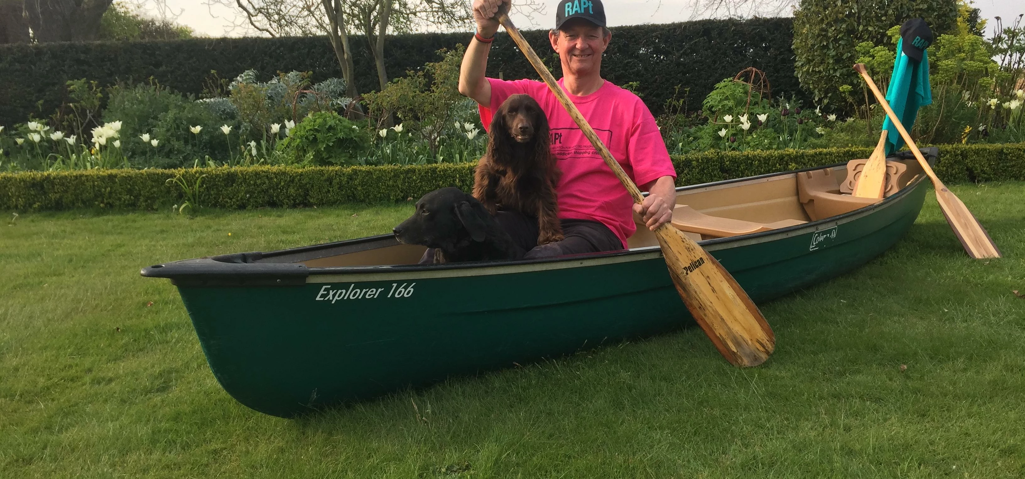 Charlie Forbes Adam with canoe - and dogs!