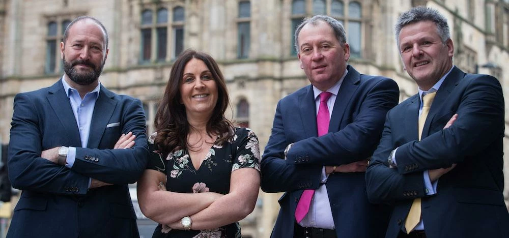 L-R: Ian and Sue Waxman with Scanlans' Ian Stanistreet and Tony Mancini