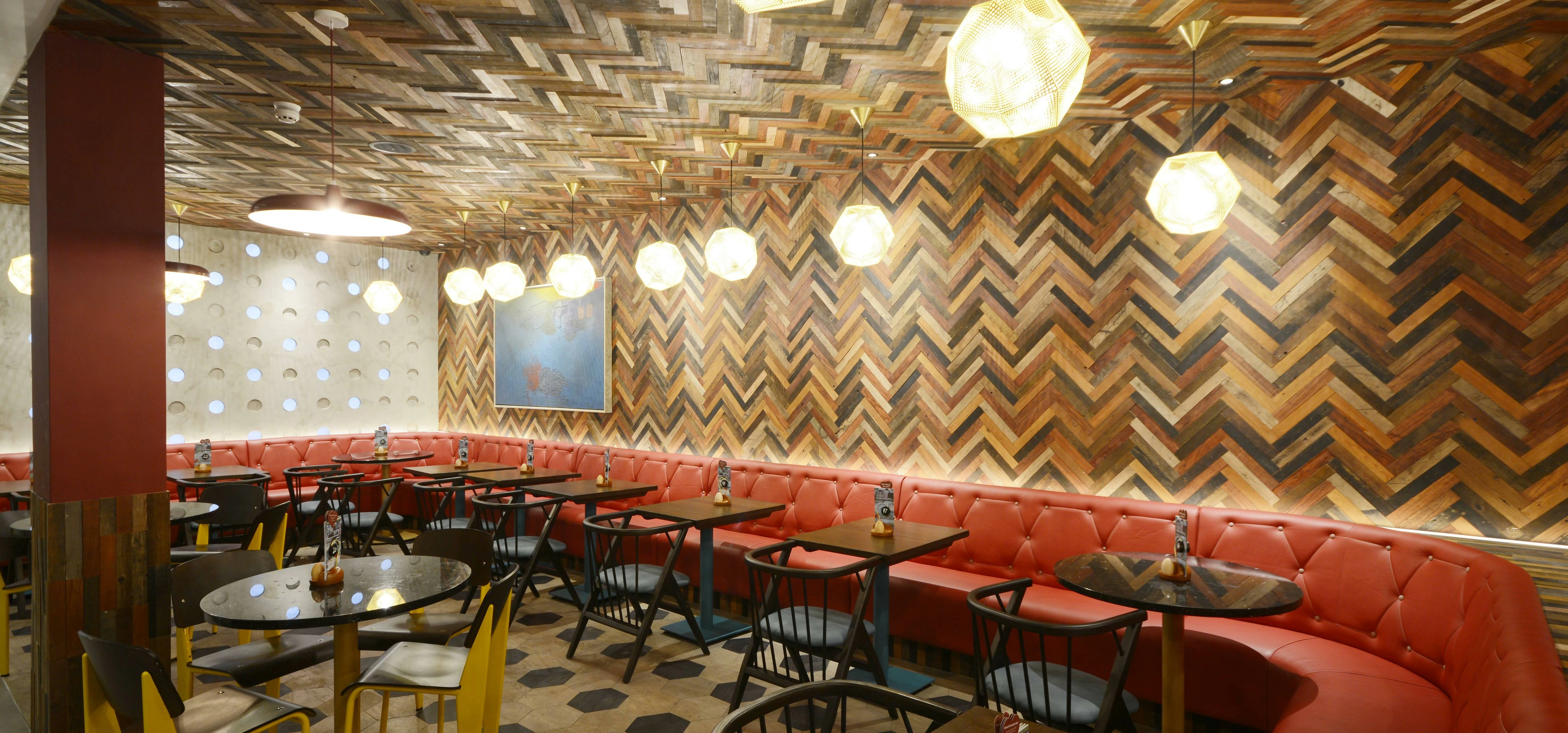 the award winning new Nando’s restaurant in central London delivered by hcm interiors