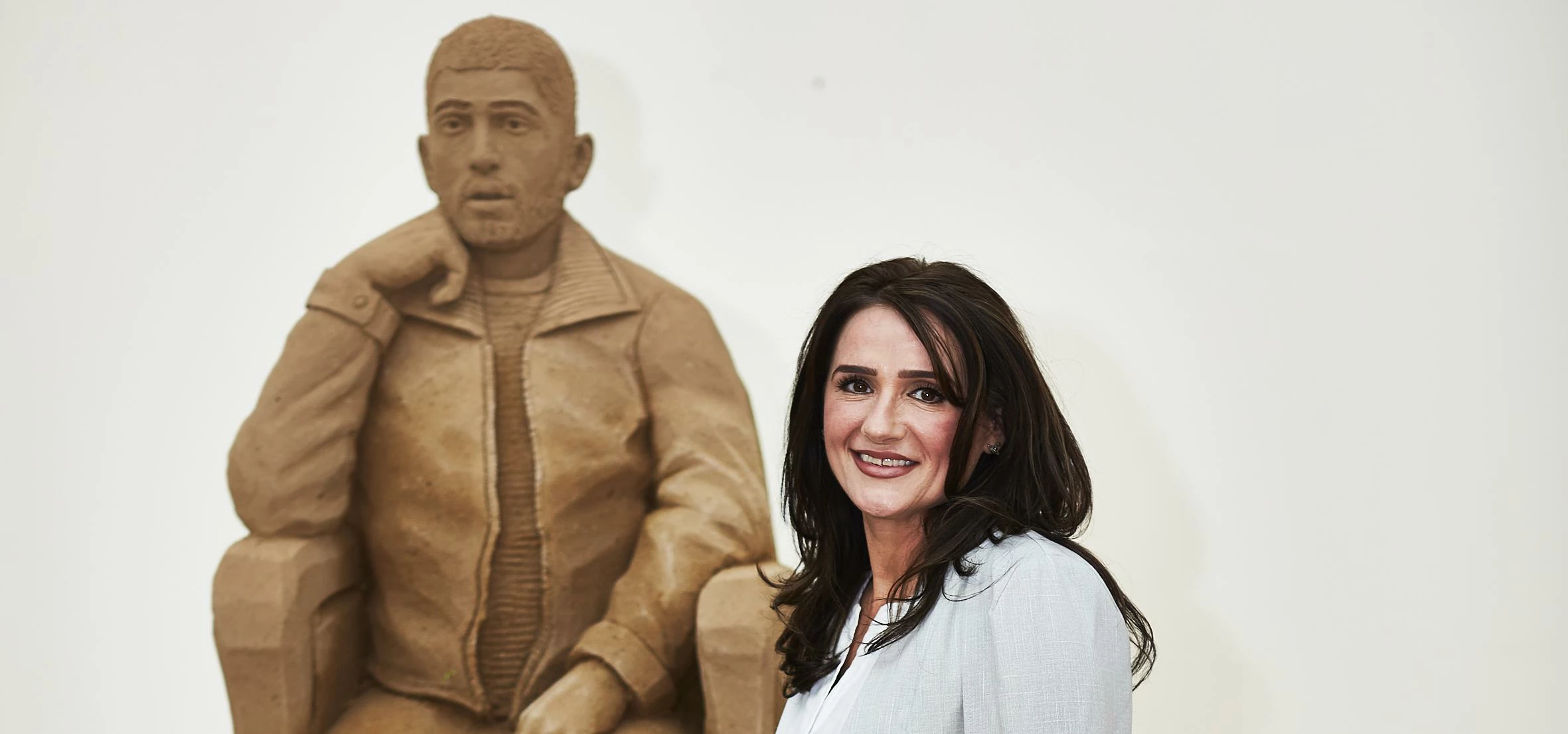 Tricia Malik with The Broadway's sand sculpture of her son Zayn