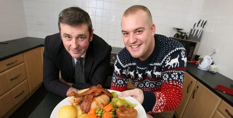  Daniel Wilkinson (right)  of Sunday Dinner Delivery has a meal ready for Peter Taylor from investor