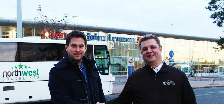  LJLA’s Danny Williams welcomes Northwest Coachlines’ Steve Elms to the Airport.