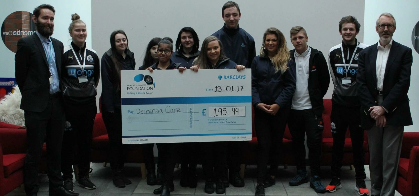 Pupils from Studio West School with cheque for Dementia Care