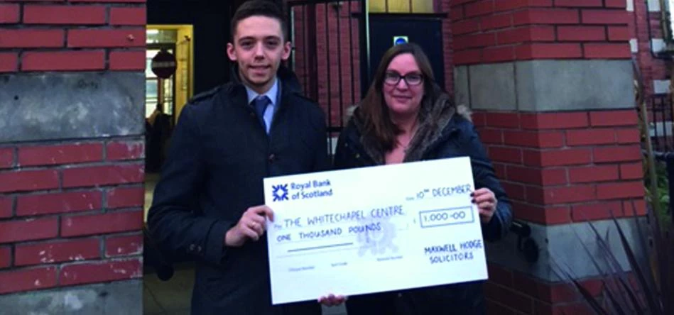 L-R: Jake Rosenthal from Maxwell Hodge Solicitors and Ruth McCaughley, Fundraising Manager for The W