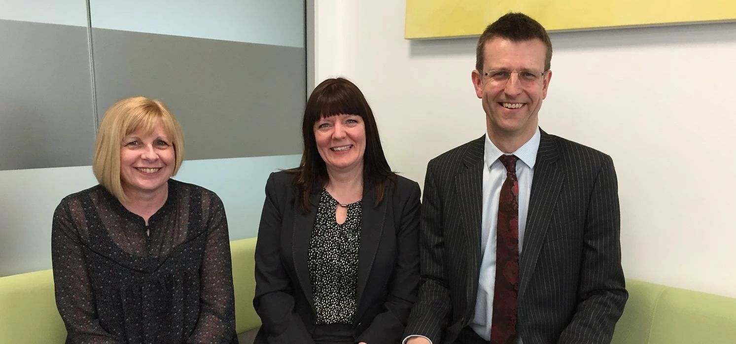 (left/right) Amanda Cowley, director of residential conveyancing, with Anne Emmerson and Neil Salter
