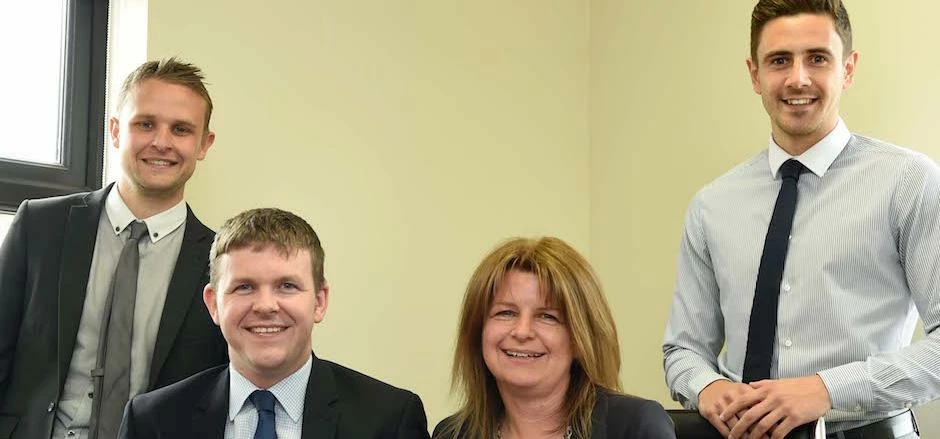 Erimus Insurance Brokers director Ian Miller (second right) with new recruits Lewis Kaid, Jacqui Wat