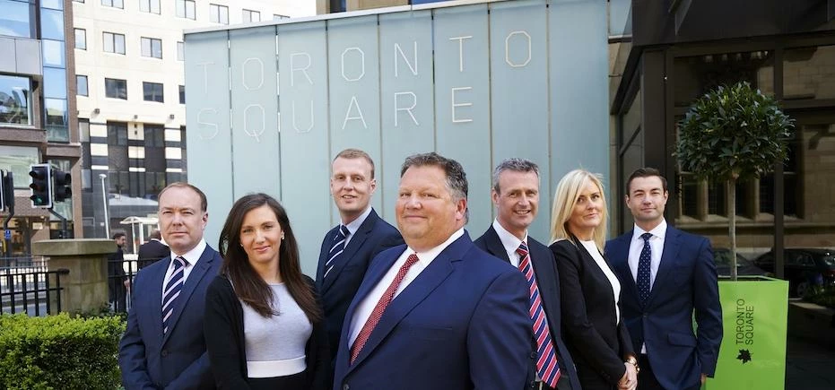  CBRE’s Leeds Managing Director Richard Sunderland with recently promoted staff. 