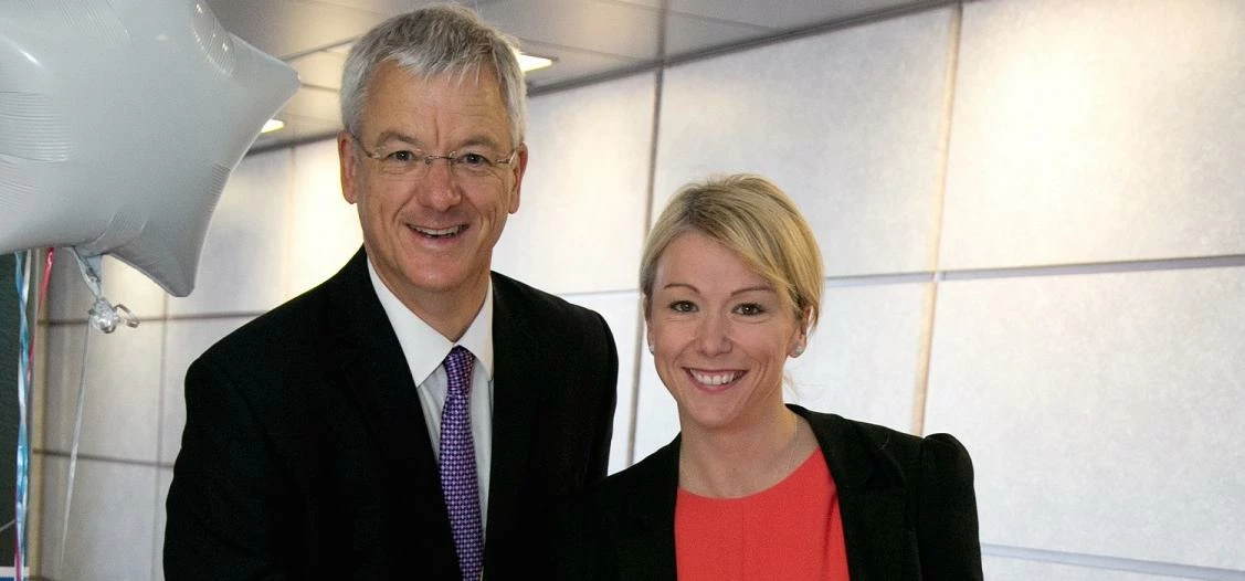 Bob Schumacher (left) with Collette Roche, director of security and customer service, Manchester Air