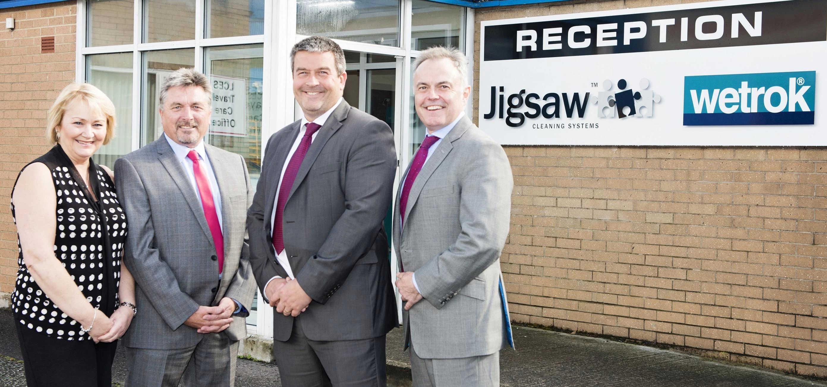 Representatives of Jigsaw Cleaning Systems and Wetrok outside the new training centre