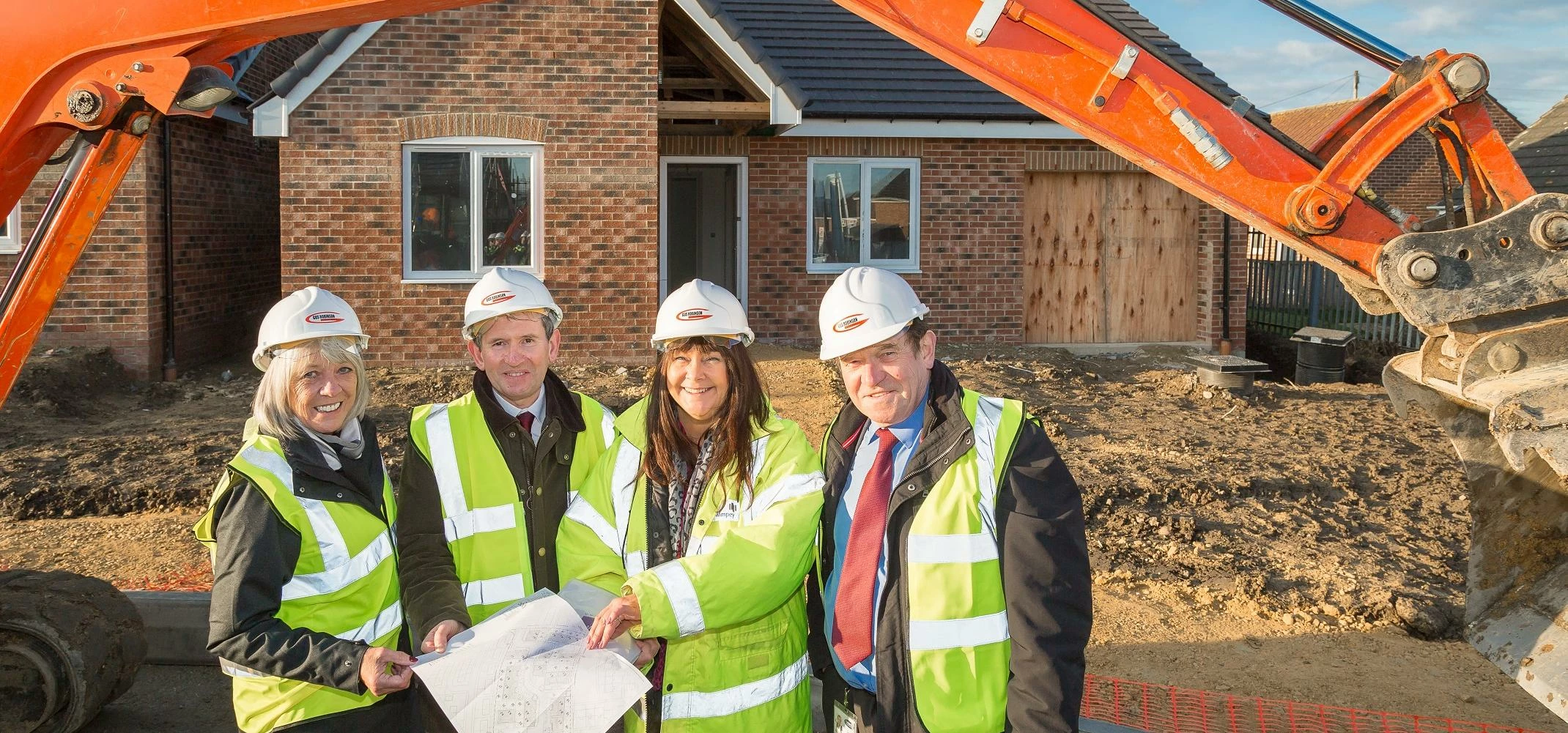 (L-R) Cllr Barbara Armstrong; Keith Tallintire, Director of Resources with Derwentside Homes; Moya J