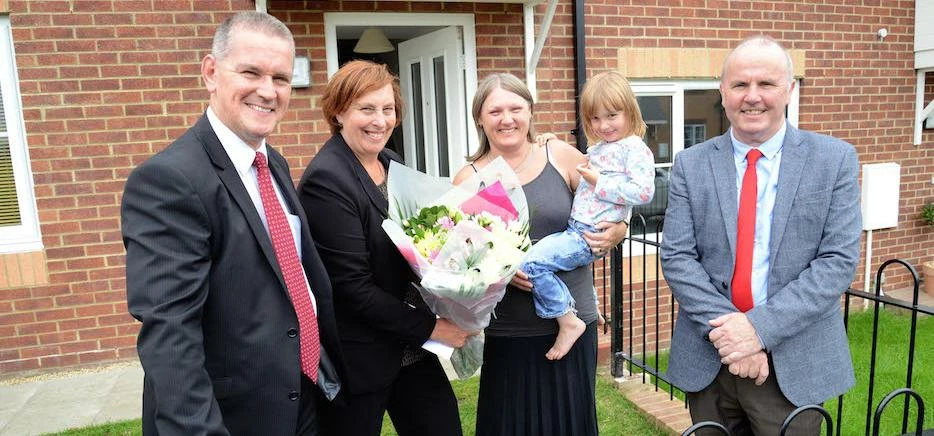 (from left to right): Angela Lockwood (second left), CEO of North Star, presents tenant Ann Matthews