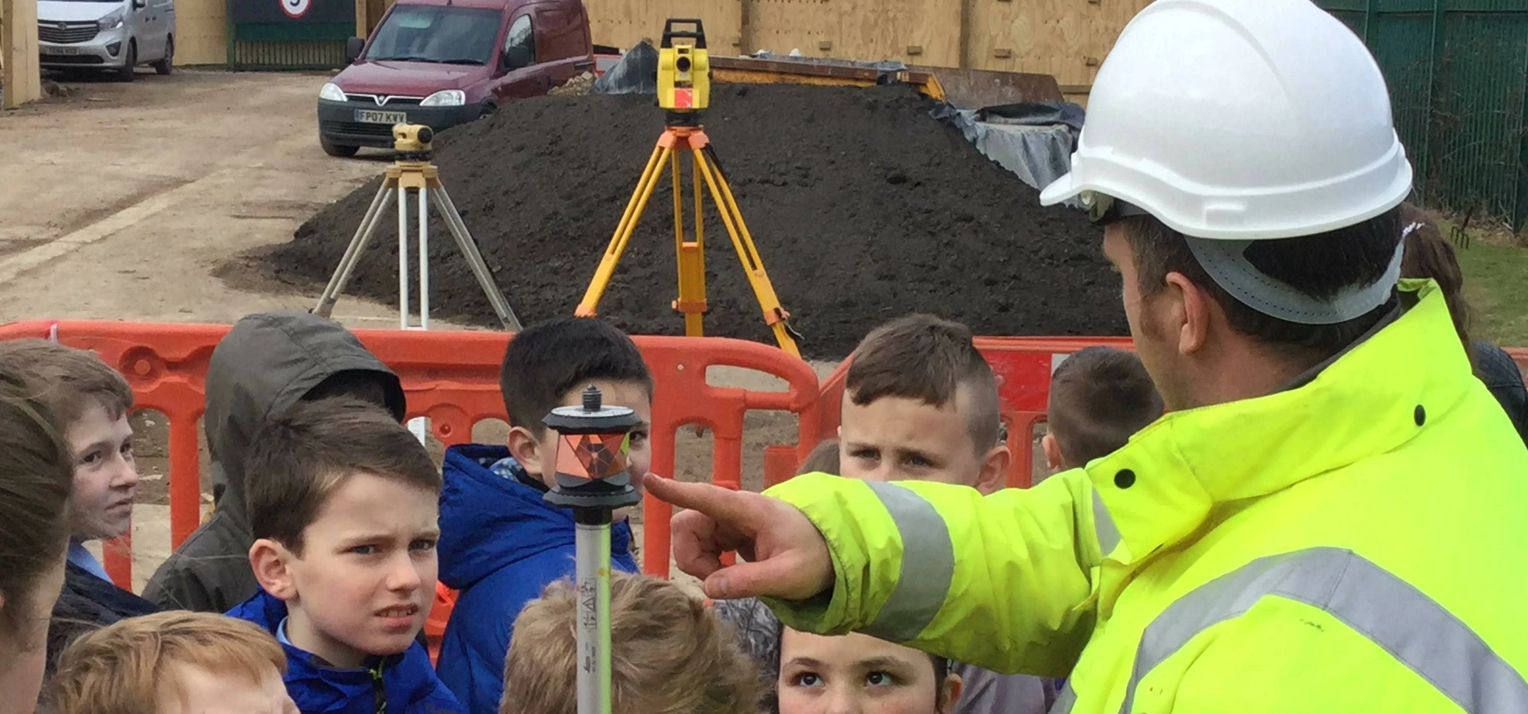 Harris Site Manager Marc Blackwell shows children around the Guisborough construction site