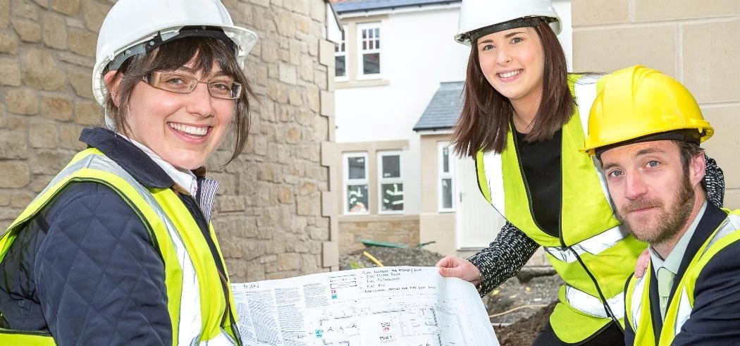 Alex (left) Gillian and Simon on a housing development where SCL is providing utility services.