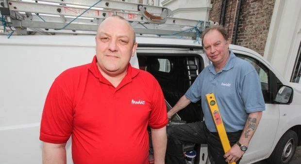 Founder John Courtney, with heating engineer Don Walker