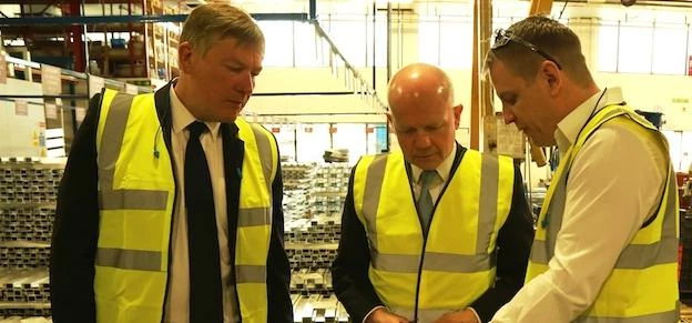 William Hague (centre) praises Acorn Stairlifts curved installation technology during his visit on 8