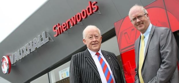 Alasdair MacConachie, managing director of Sherwoods, with director of motor retail at The Royal Ban