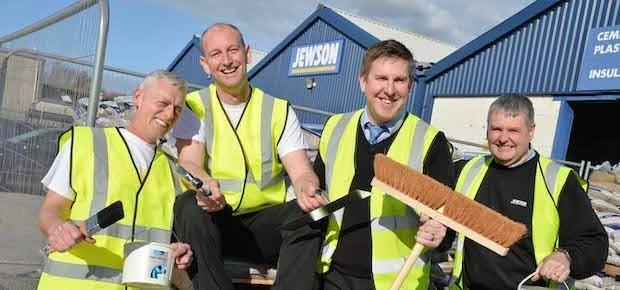 Jewson employees outside one of the brands 600 UK branches