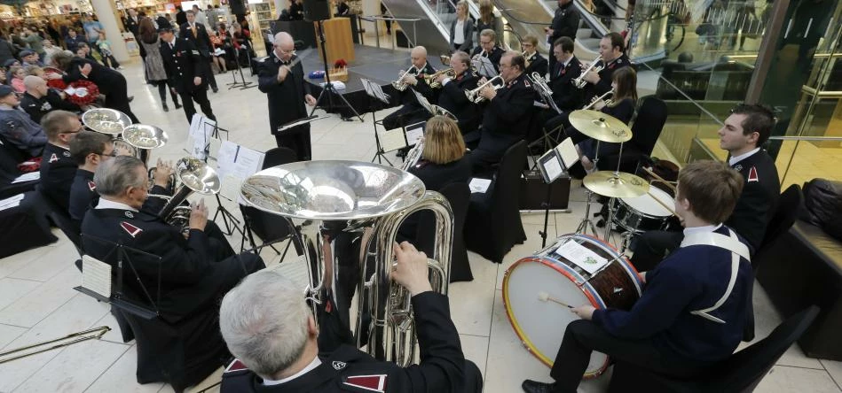The Salvation Army, Newcastle City Temple band performing for the congregation at intu Metrocentre's