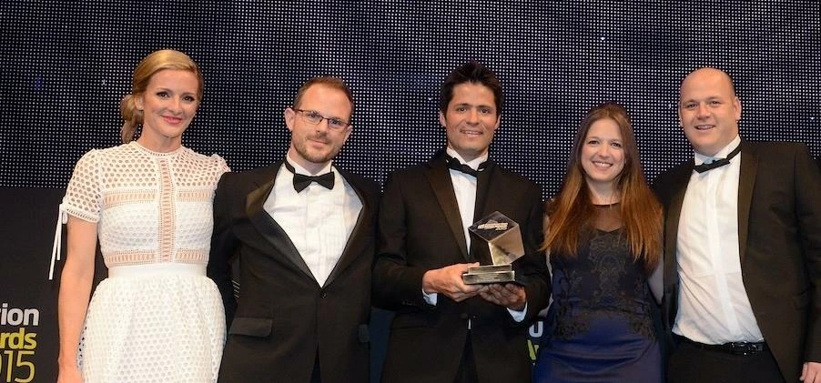 The Thomson Ecology team collect their innovation award from Gabbie Logan at the Construction News 2