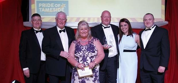 Shaun Allen and the Team from Challenger Site Services receiving their Pride of Tameside Business Aw