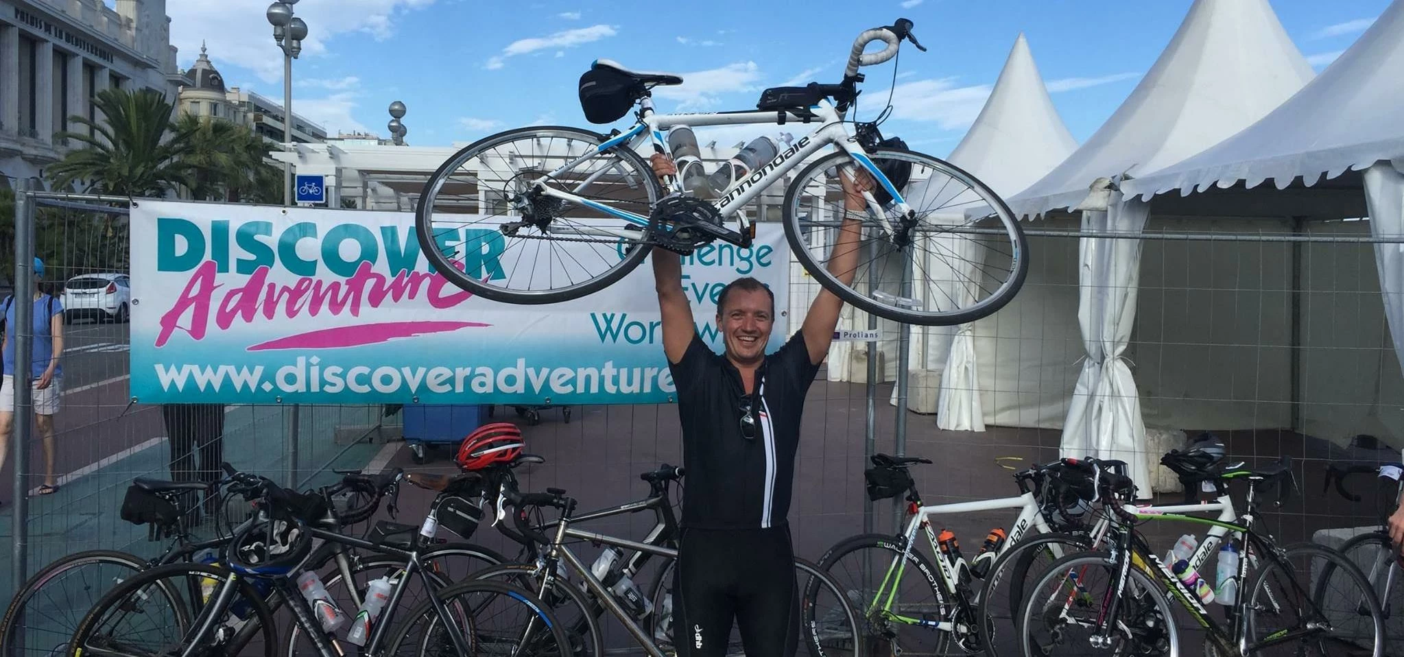 Jason Lowe, from Equilibrium Asset Management, finishes his charity bike ride
