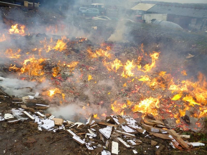 Burning waste
